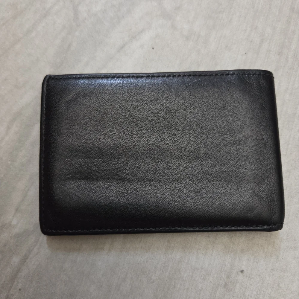 Like New TUMI Slim Bifold Soft Black Leather Wallet